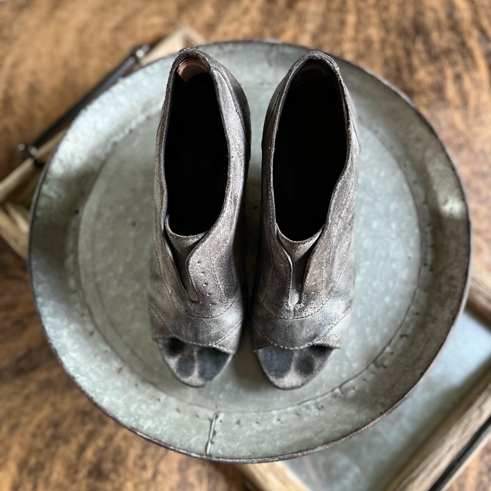 Joe’s grey leather mules with 4 1/2 inch wedge heel. Gently worn.
